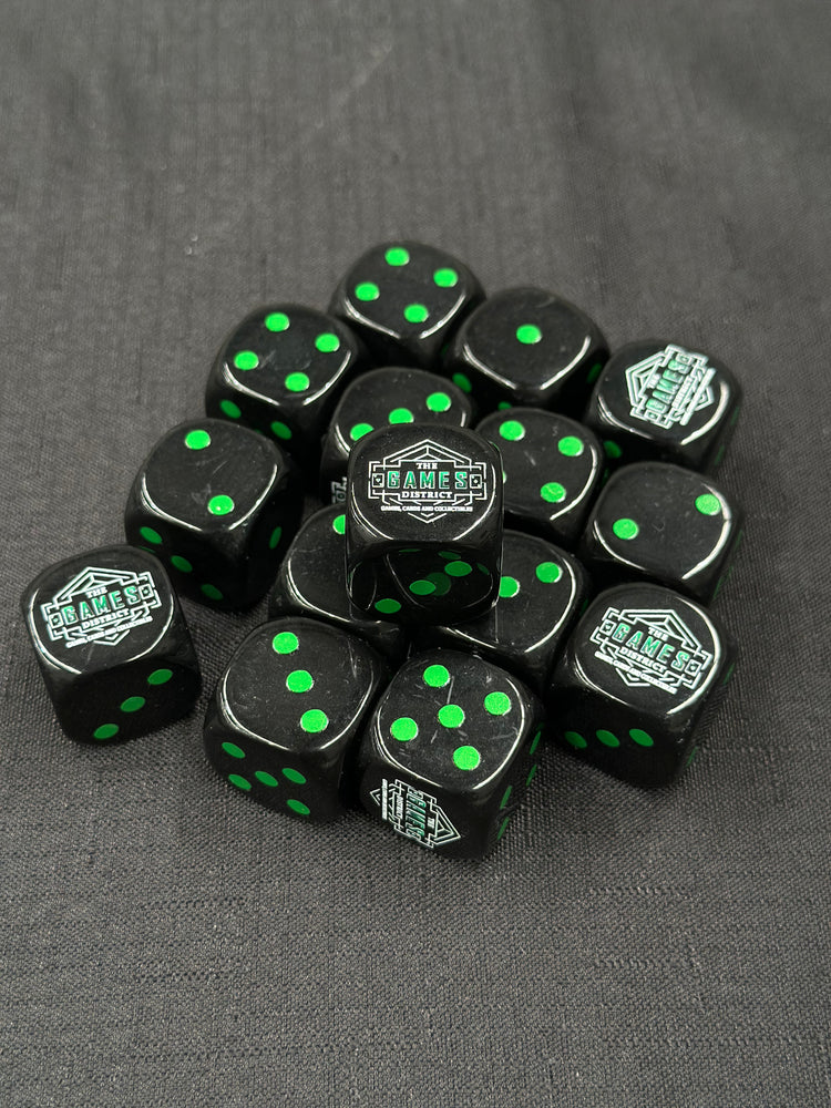 25mm "The Games District" Dice | Black with Green Pips